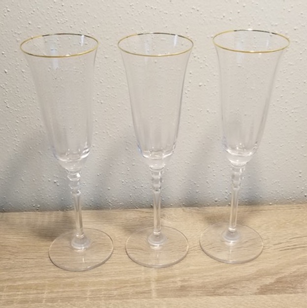 3 gold rimmed lead crystal flutes